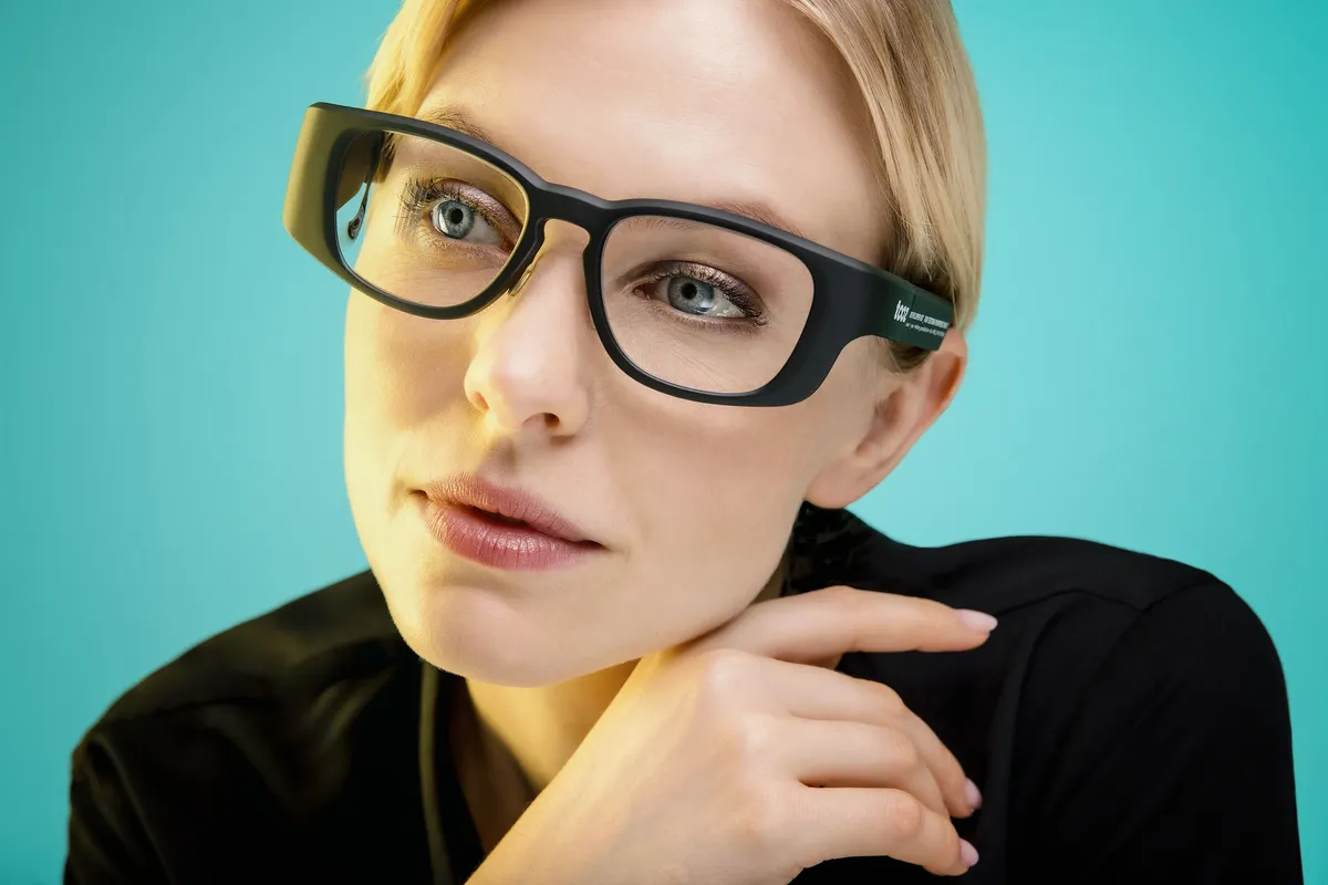 Woman wearing ZEISS smart glasses